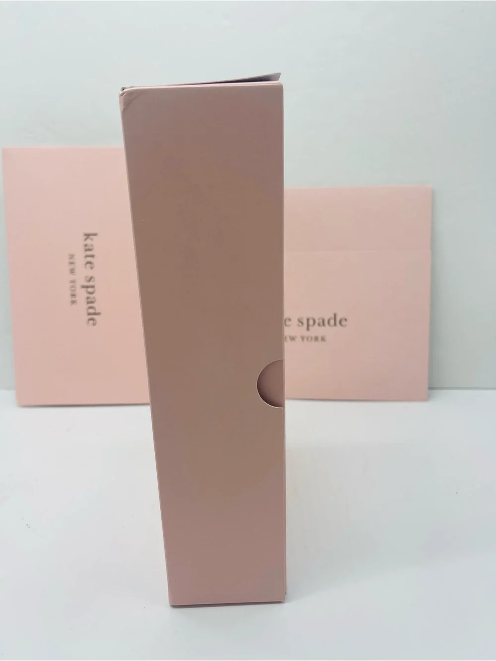 kate spade blush pink gift box with purple logo bag New